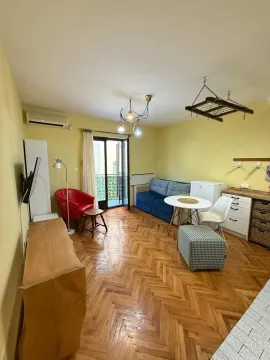 Living room with parquet flooring, furniture and access to the terrace. - image 3