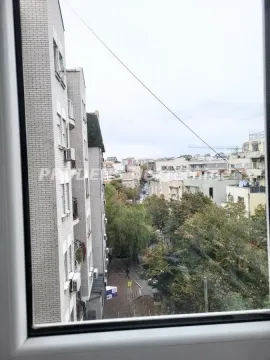 View through the window of surrounding buildings and urban neighborhood. - image 20