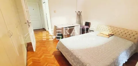 Furnished bedroom with a double bed and wardrobe. - image 3
