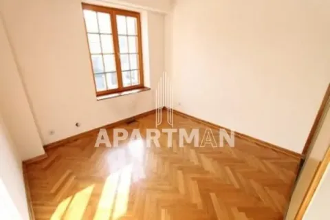 Empty room with hardwood flooring and a window. - image 3