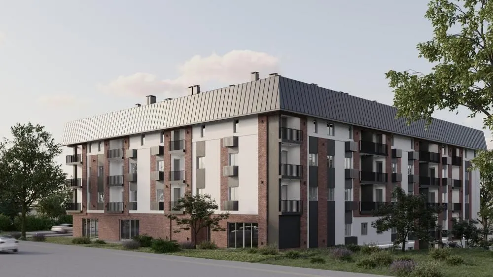Pogled na spoljašnjost moderne stambene zgrade sa terasam i uređenim okruženjem.