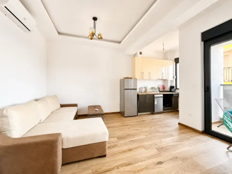 Bright living room connected to the kitchen with access to the terrace. - image 6