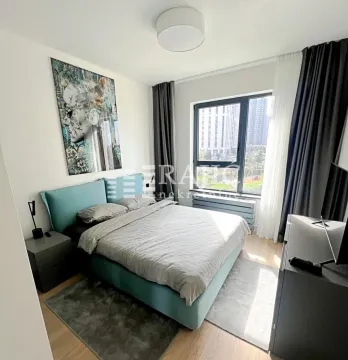 Modern bedroom with a double bed, art painting and large window. - image 8