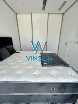 View of the double bed in the bedroom with a built-in wardrobe. - image 8