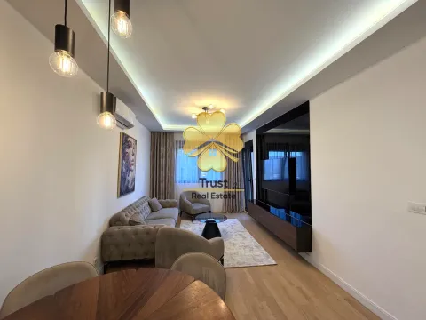 Modern and bright living room with a sofa set and dining table. - image 3