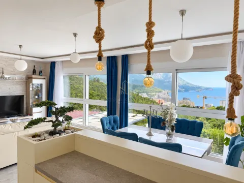 Living room with dining area and sea view. - image 6