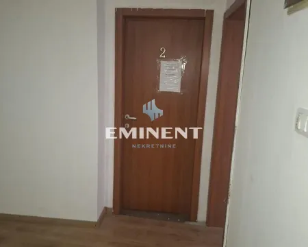 A hallway with wooden interior doors. - image 16