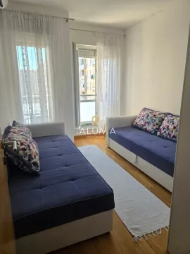 Living room with two sofas and access to the terrace. - image 6