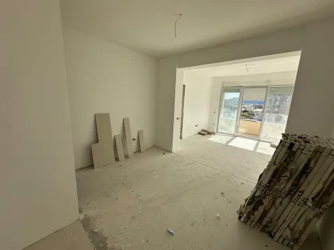 Unfinished room in an apartment with construction materials. - image 8