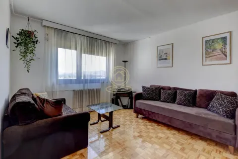 Living room with a sofa set and parquet flooring. - image 8