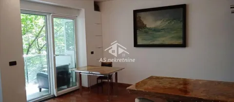 Dnevna soba sa trpezarijskim stolom i izlazom na terasu. - image 6