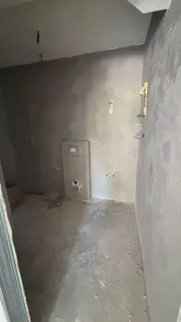 Unfinished room in the rough construction phase. - image 2