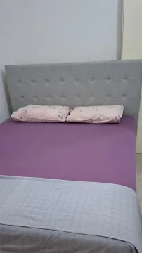 Furnished bedroom with a double bed. - image 8