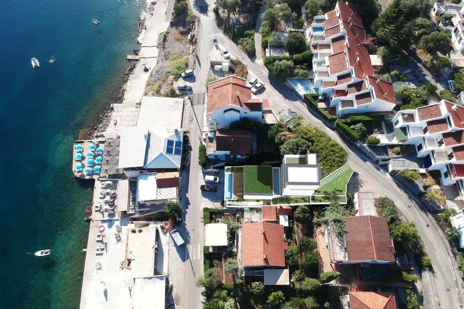 Pogled iz vazduha na priobalno naselje sa ucrtanim objektom.