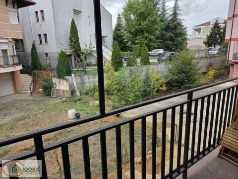 View from the balcony overlooking the yard and neighbouring buildings. - image 14