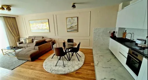 Modern living room with dining area and kitchen in bright tones. - image 4