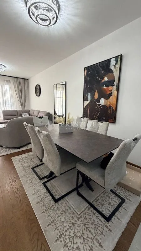 Living room with a dining table and chairs.