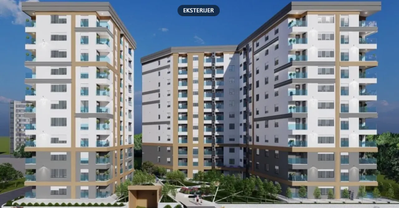 Exterior view of the residential complex with landscaped courtyard.