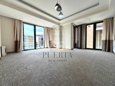 Spacious empty room with carpet and large glass surfaces. - image 2
