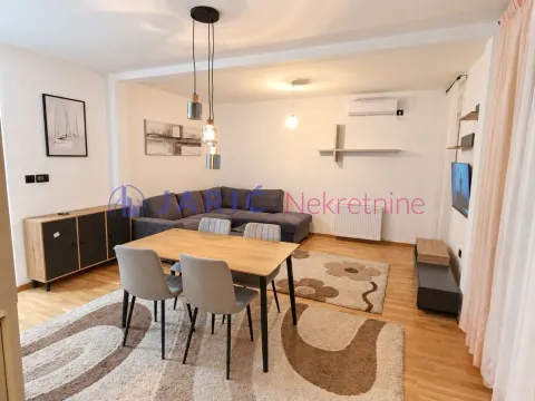 Spacious living room with a dining area and modern furniture. - image 12