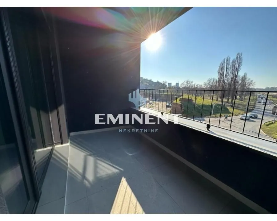 Modern and bright balcony with a view of the surroundings.