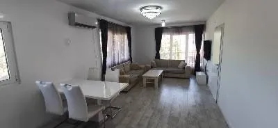 Living room with dining area and seating set. - image 3