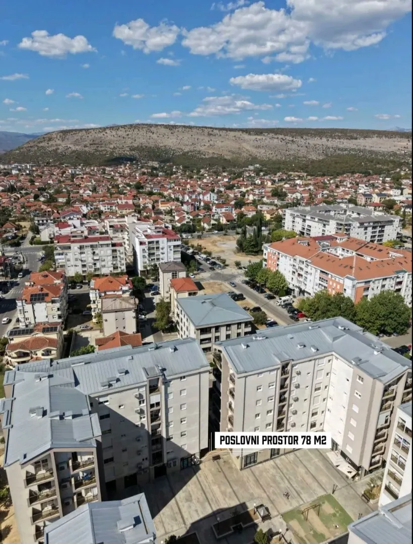 Aerial view of residential buildings and the neighborhood.