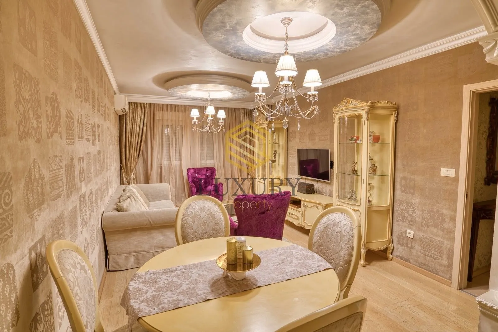 Spacious living room with a dining area and classic furniture.