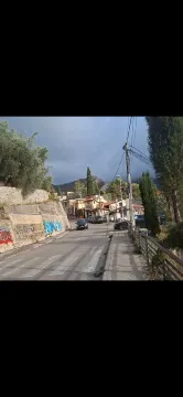 Pogled na ulicu i okolne objekte u naselju. - image 5