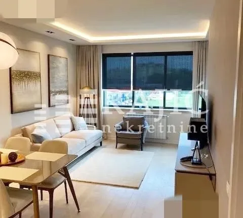 Modern and bright living room with a dining area.
