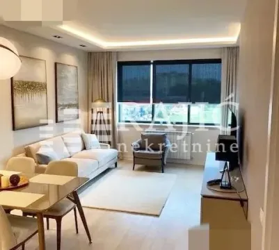 Modern and bright living room with a dining area. - image 2