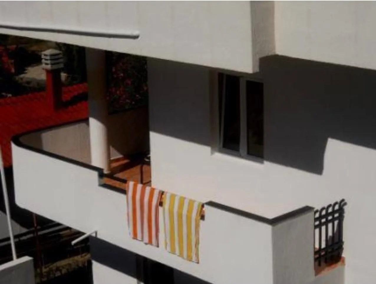 View of the terrace and part of the building facade.
