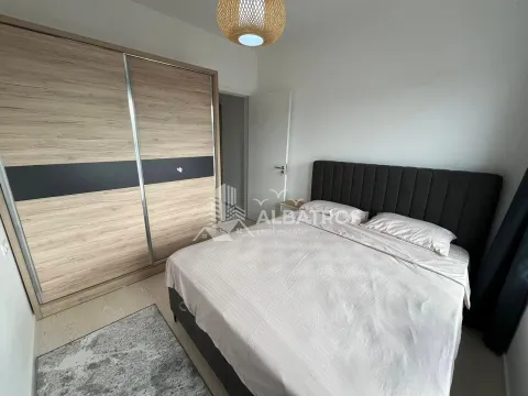 Bedroom with a double bed and a large fitted wardrobe. - image 8