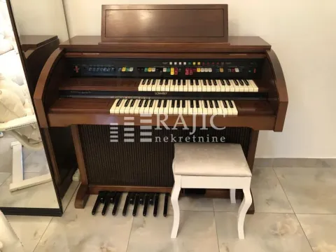 Wooden organ with a bench in the interior. - image 18