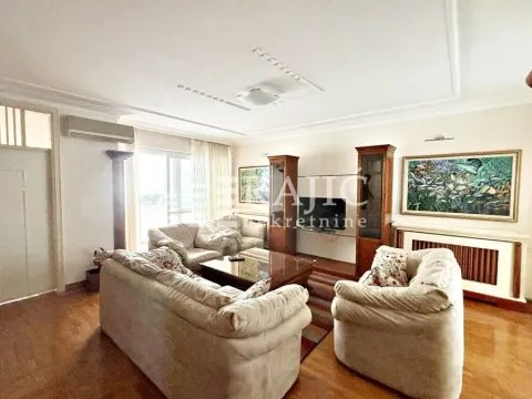 Spacious living room with seating set and wooden furniture. - image 17