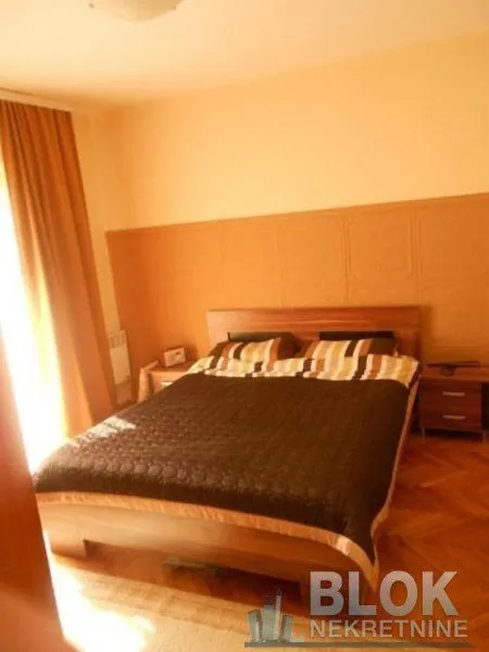 Bedroom with a double bed and bedside tables.