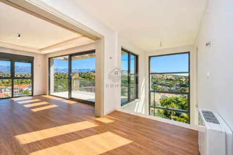 Spacious bright living room with large glass surfaces and a view of the surroundings. - image 20