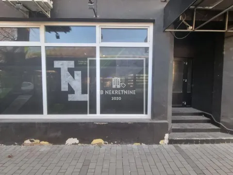 Exterior of the commercial space with entrance and display window. - image 12