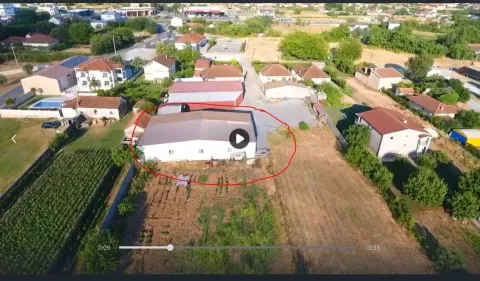 Aerial view of the building and the surrounding land. - image 3