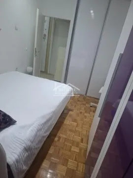 Furnished bedroom with a double bed and a fitted wardrobe. - image 7