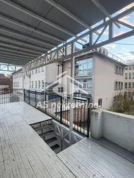Large covered terrace with a metal structure and stairs. - image 26