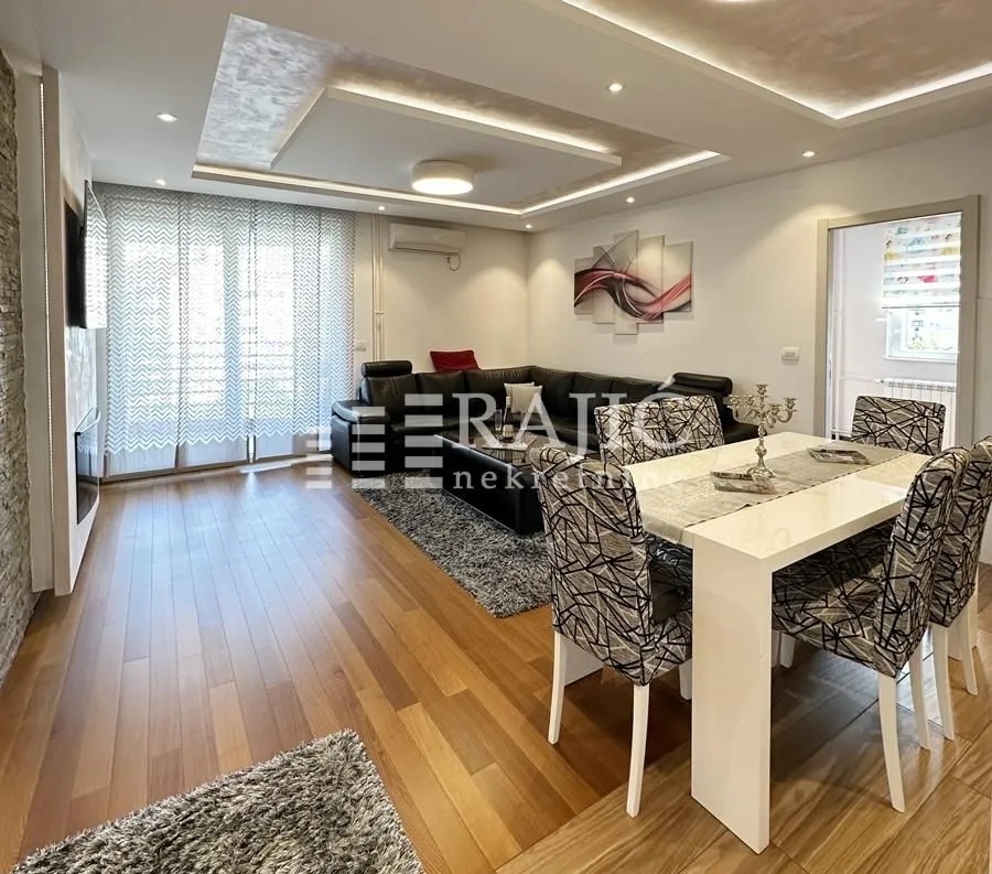 Spacious living room with a dining area and modern furniture.