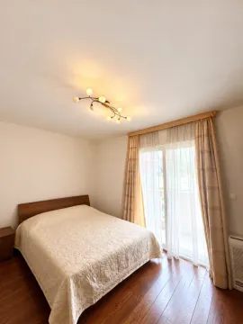 Bedroom with a double bed and access to the terrace. - image 4