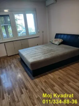Bedroom with a double bed and a window. - image 7