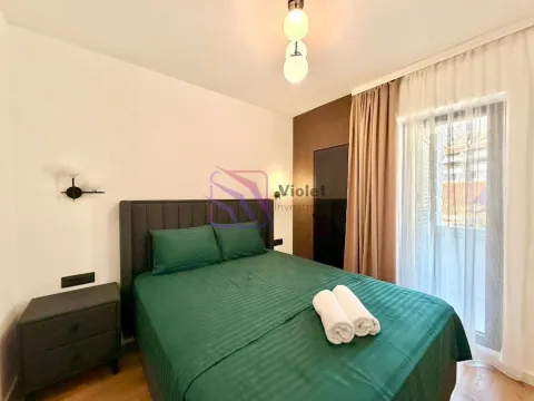 Bedroom with a double bed and access to the balcony. - image 12
