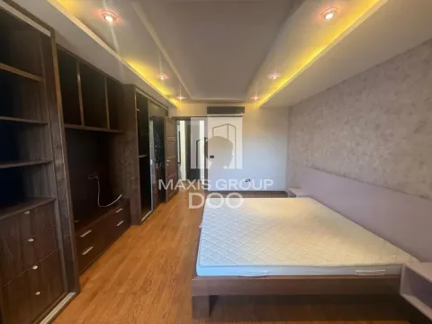 Bedroom with a double bed and fitted wardrobes. - image 6