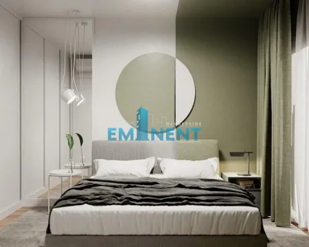 Modern bedroom with a double bed and a decorative mirror on the wall. - image 9