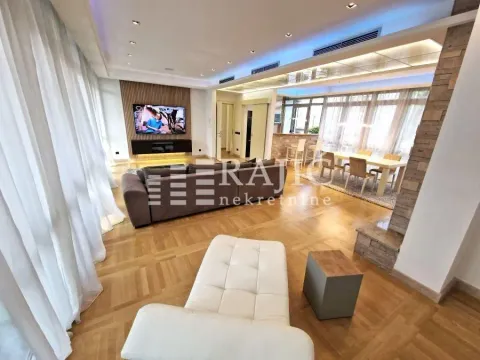 Spacious living room with sofa set and dining area. - image 16