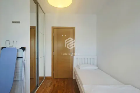 Smaller bedroom with a bed and a fitted wardrobe. - image 2