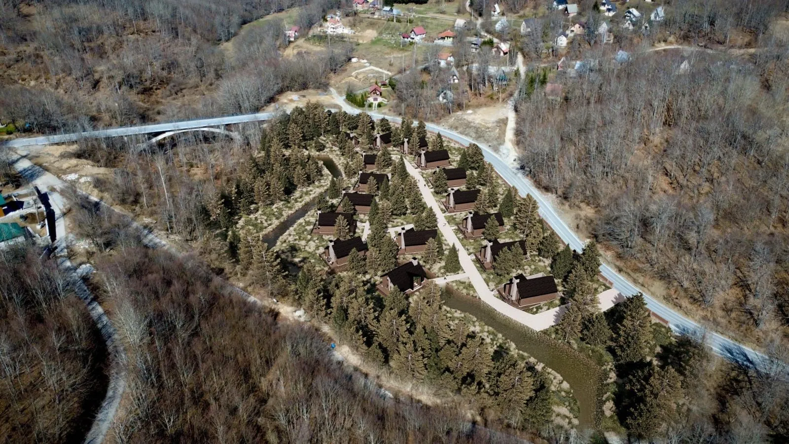 Arhitektonski vizuelni prikaz turističkog kompleksa sa drvenim kućicama u šumi.